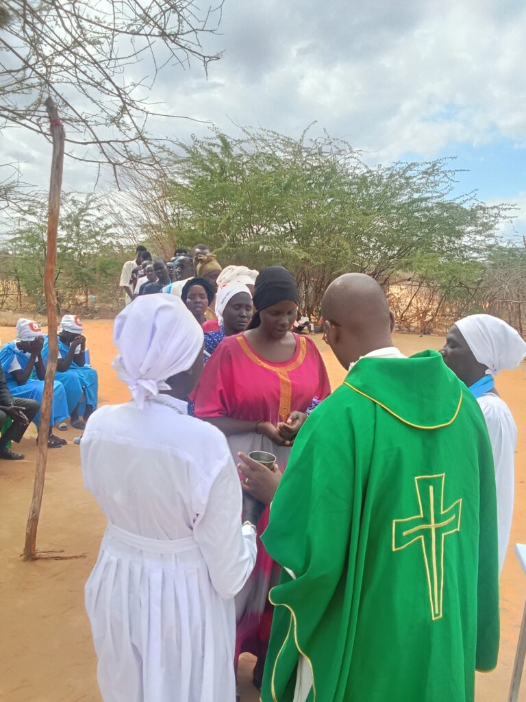 Sharing Holy Communion among the faithful's at IFO 2